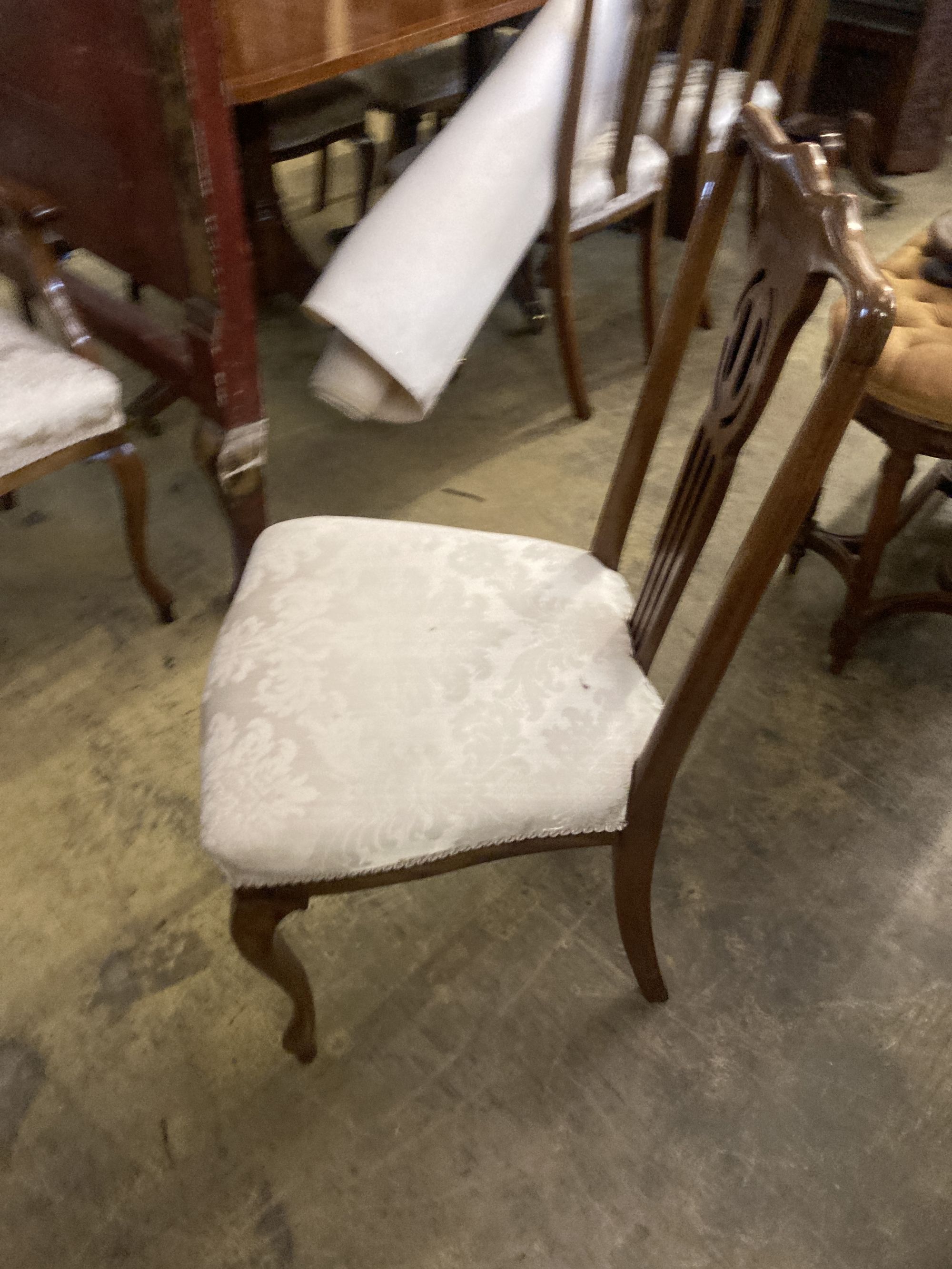 A set of eight Edwardian mahogany dining chairs (two with arms)